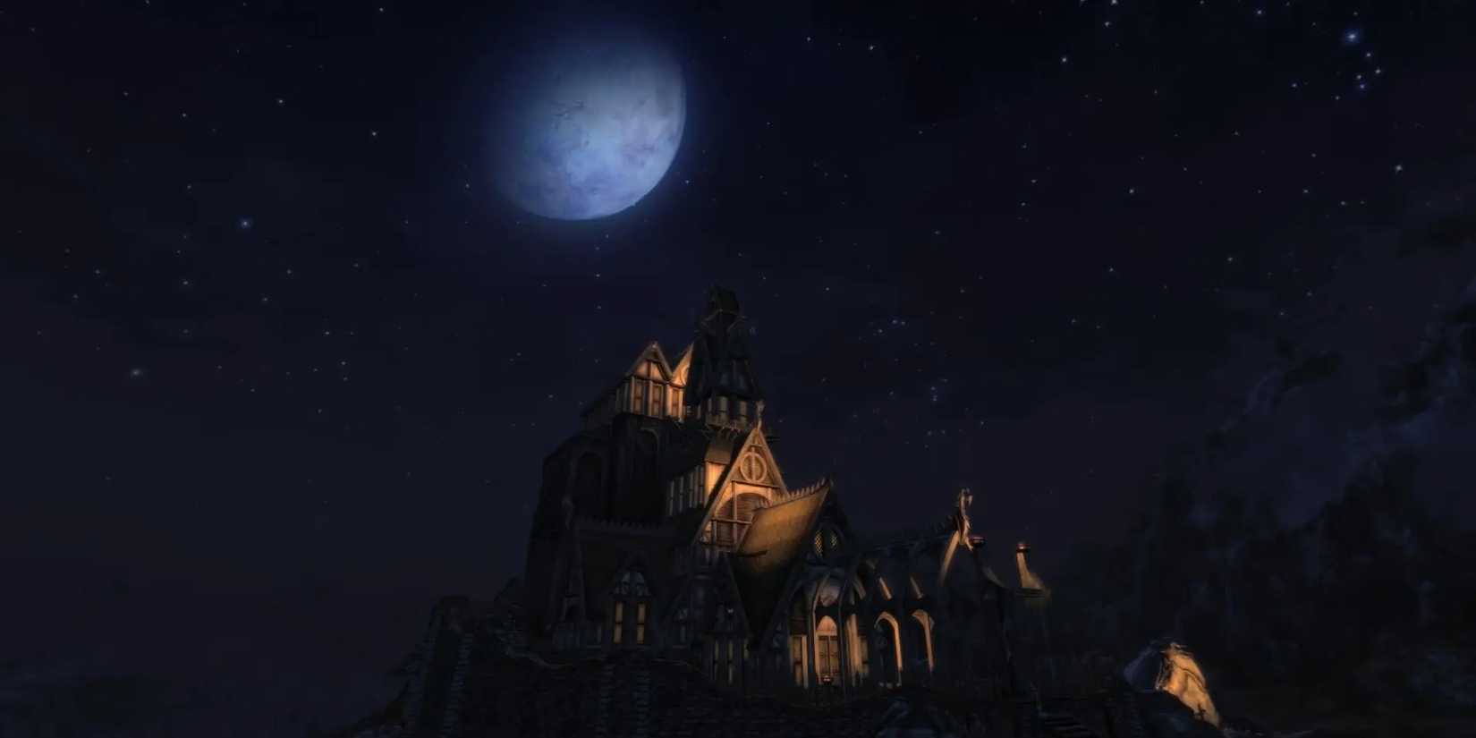 Skyrim VR: A large full moon drifting past in the night sky above whiterun.