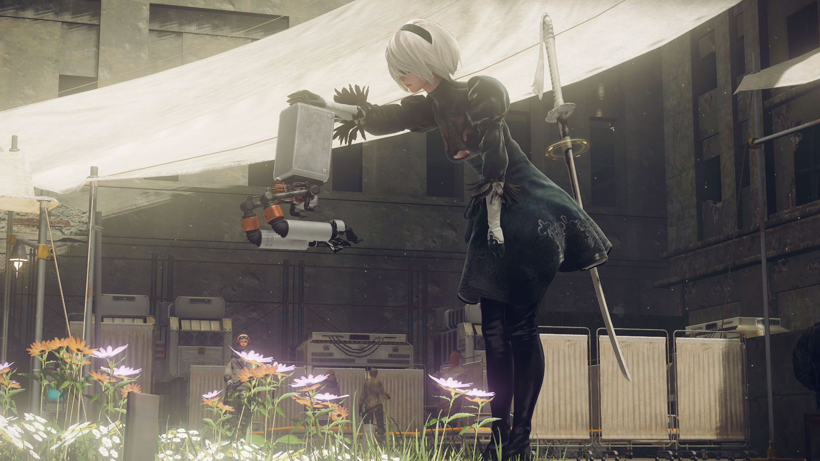 2B patting a robot on the head in Nier: Automata.
