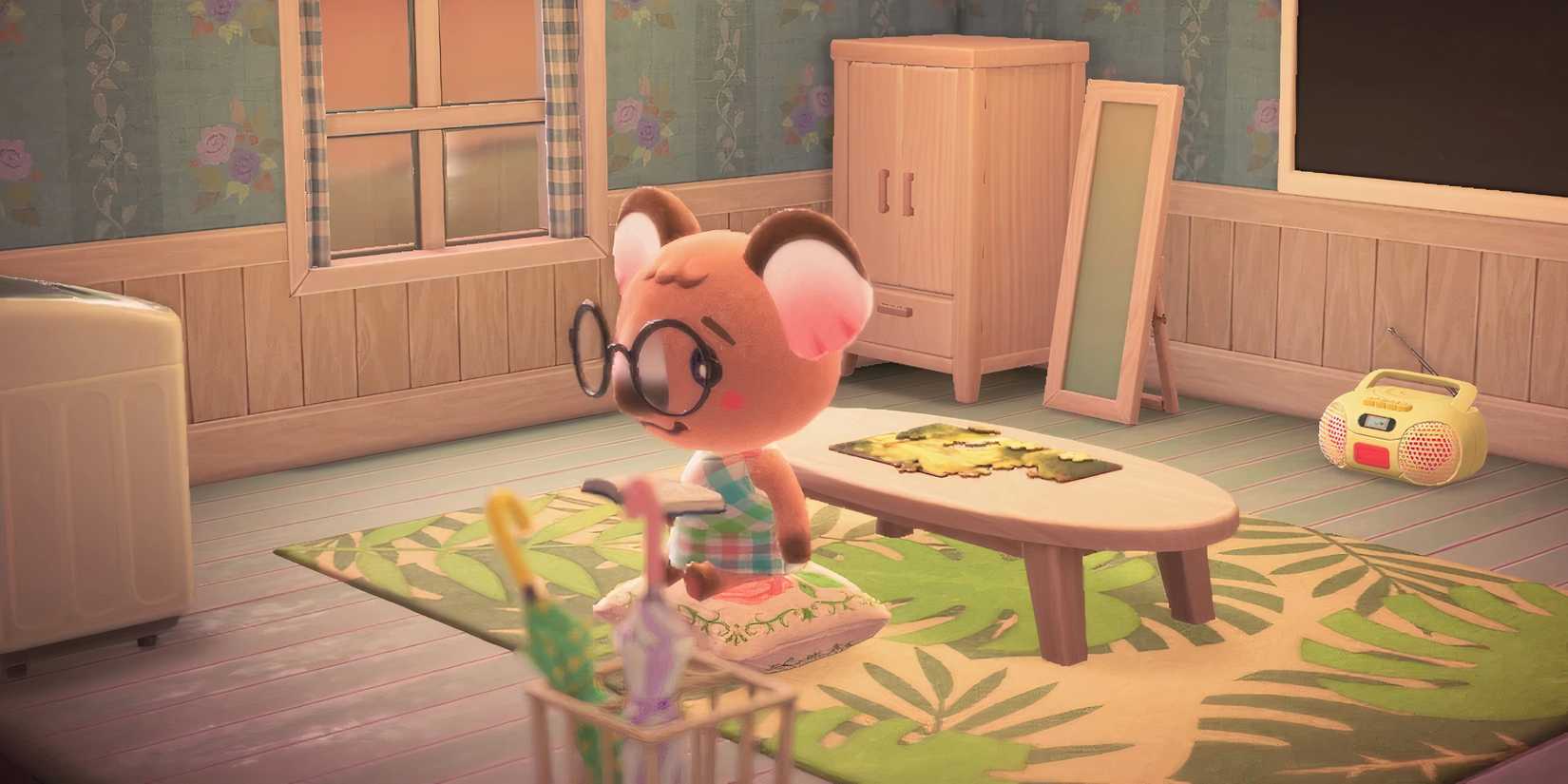 Melba reads a book in her house in Animal Crossing New Horizons.