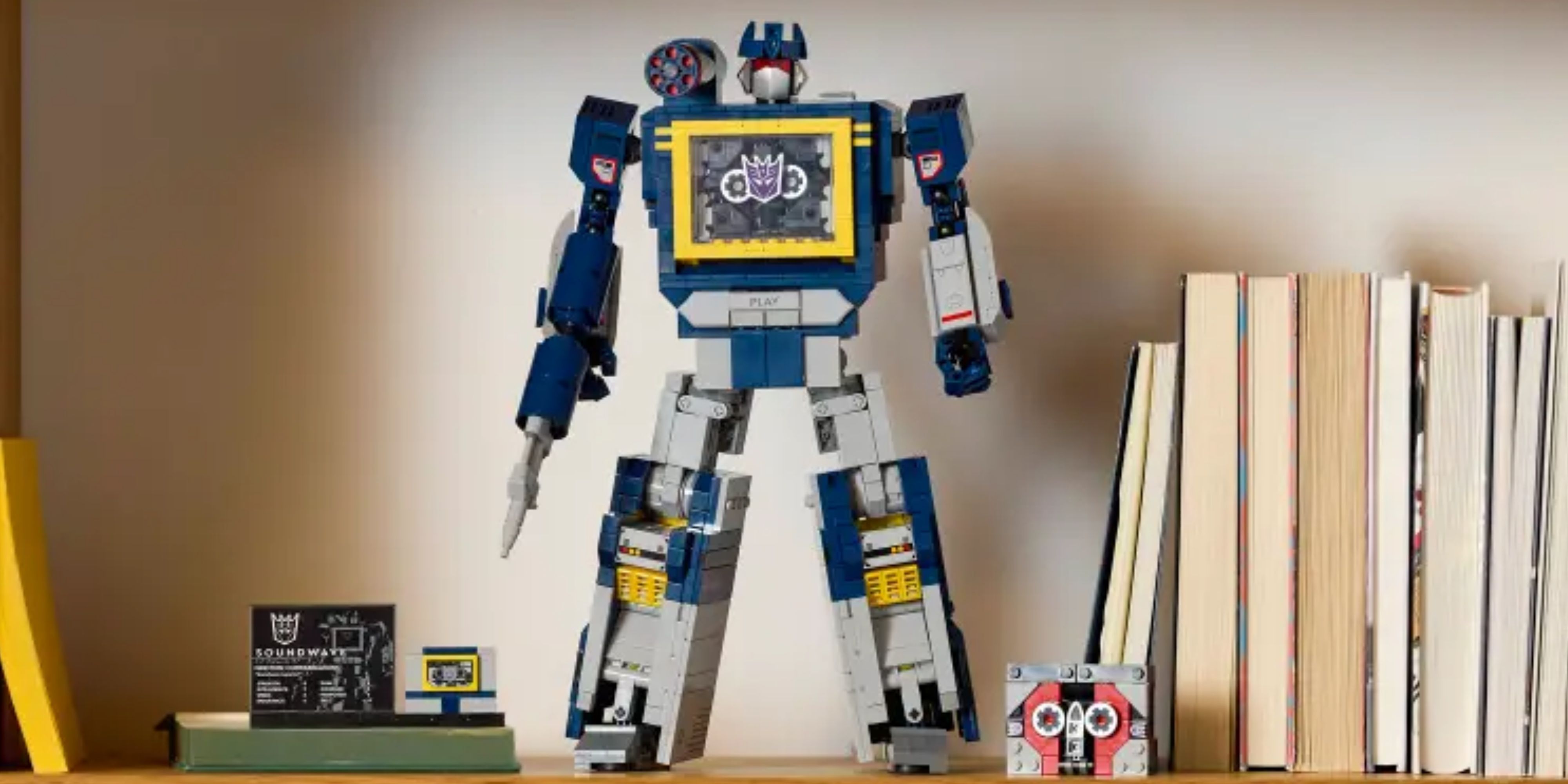 lego transformers soundwave set standing on shelf.