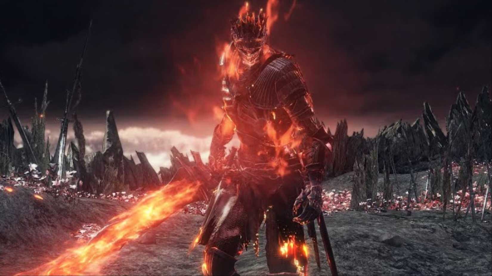 The Soul of Cinder walking toward the camera, engulfed in flame, in Dark Souls 3.