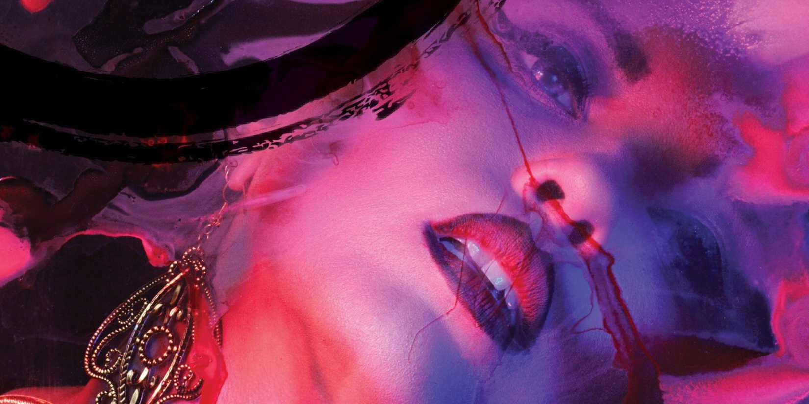 Gothic woman on Vampire The Masquerade TTRPG box