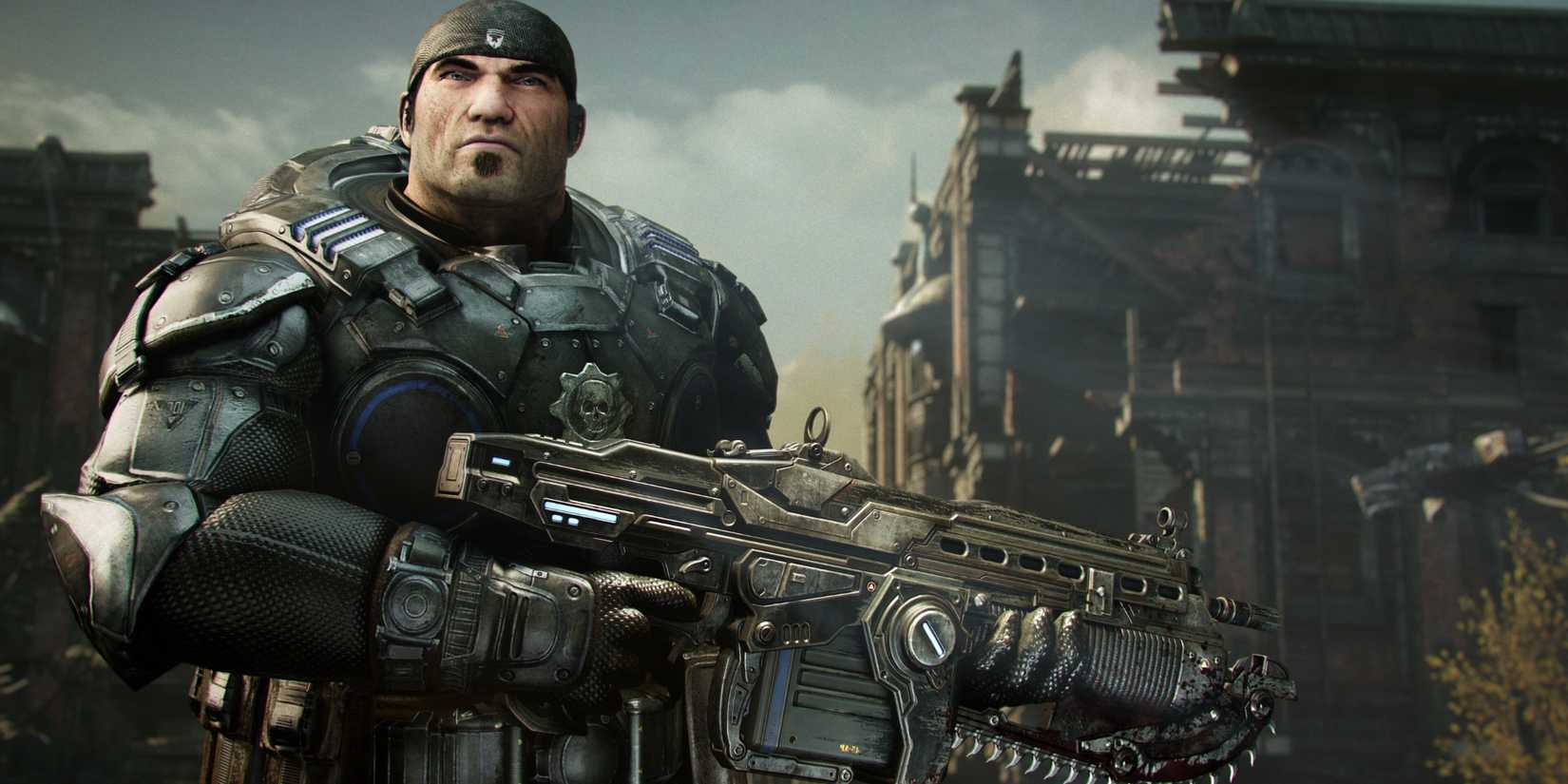 Marcus Fenix holds a lancer assault rifle and looks at the camera in Gears of War: Reloaded. 