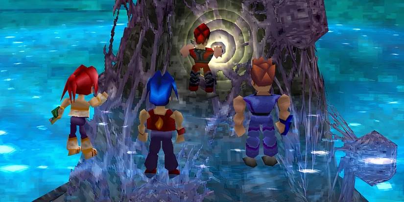 The main characters of Legend of Legaia looking at something magical around an artifact.