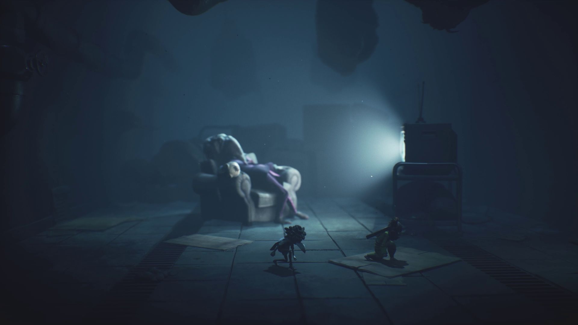 Low and Alone sneaking around in Little Nightmares 3.