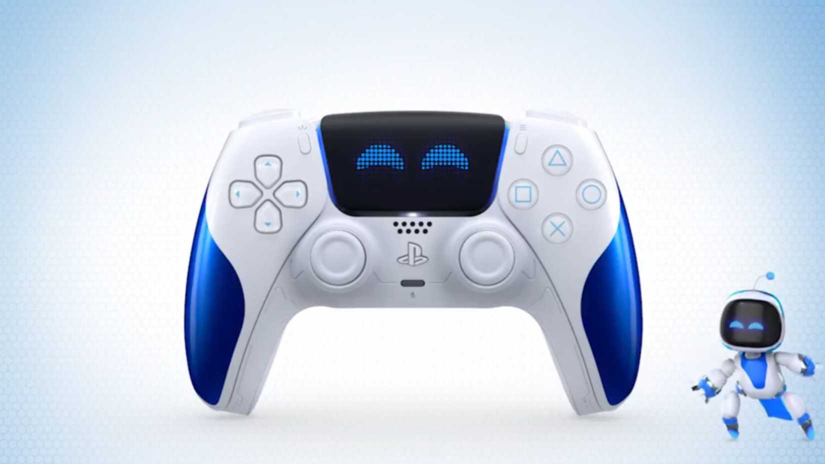 There is an Astro bot next to the DualSense controller.