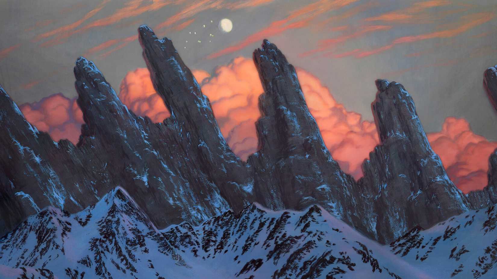 The snow-capaded mountains spread an orange to the sky of clouds.
