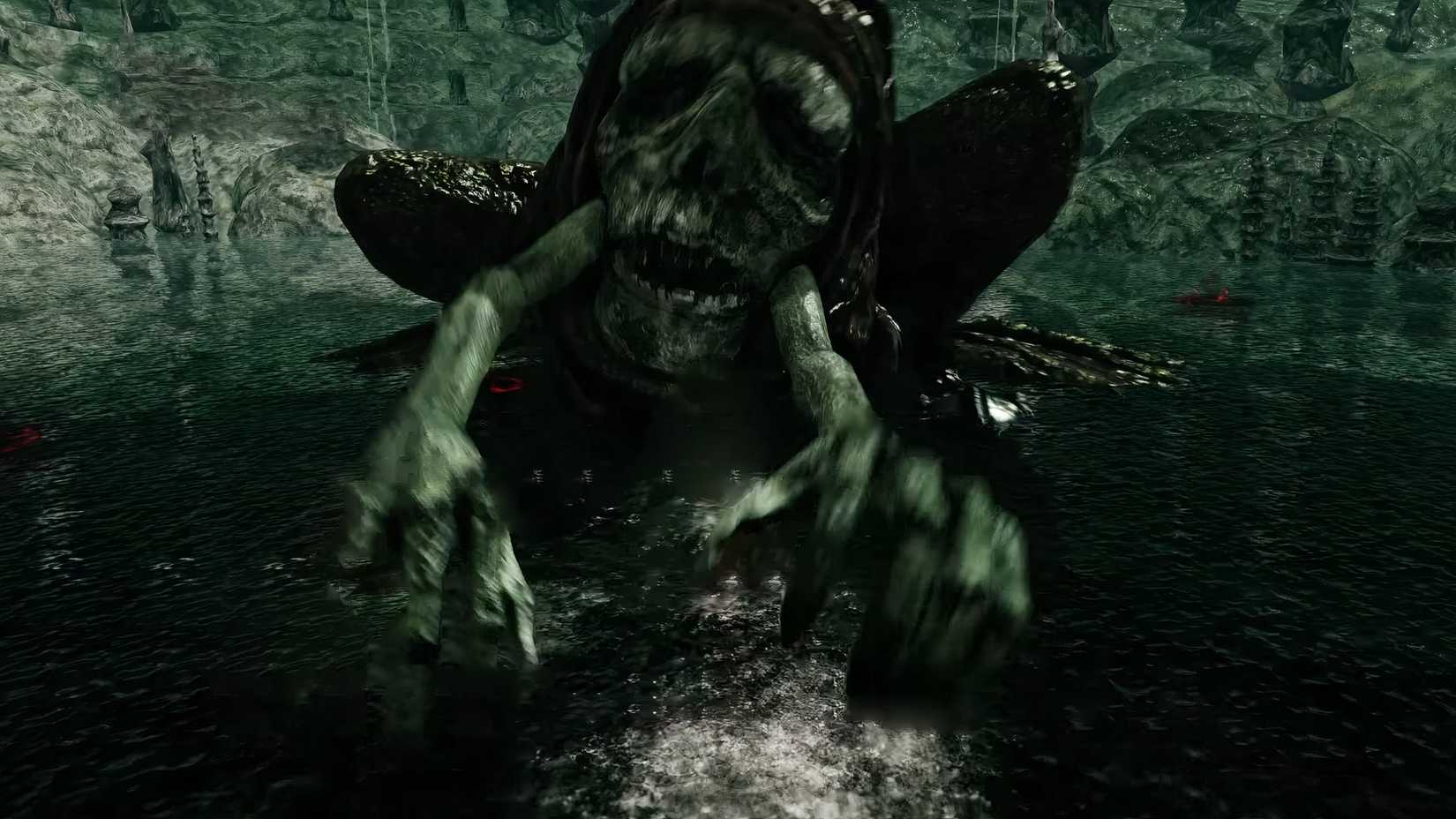 A large frog creature with humanoid faces and arms from the mouth.