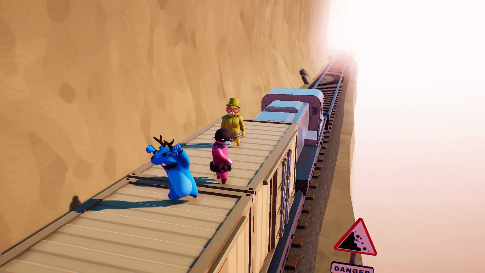 A group of players fighting atop a train in Gang Beasts.
