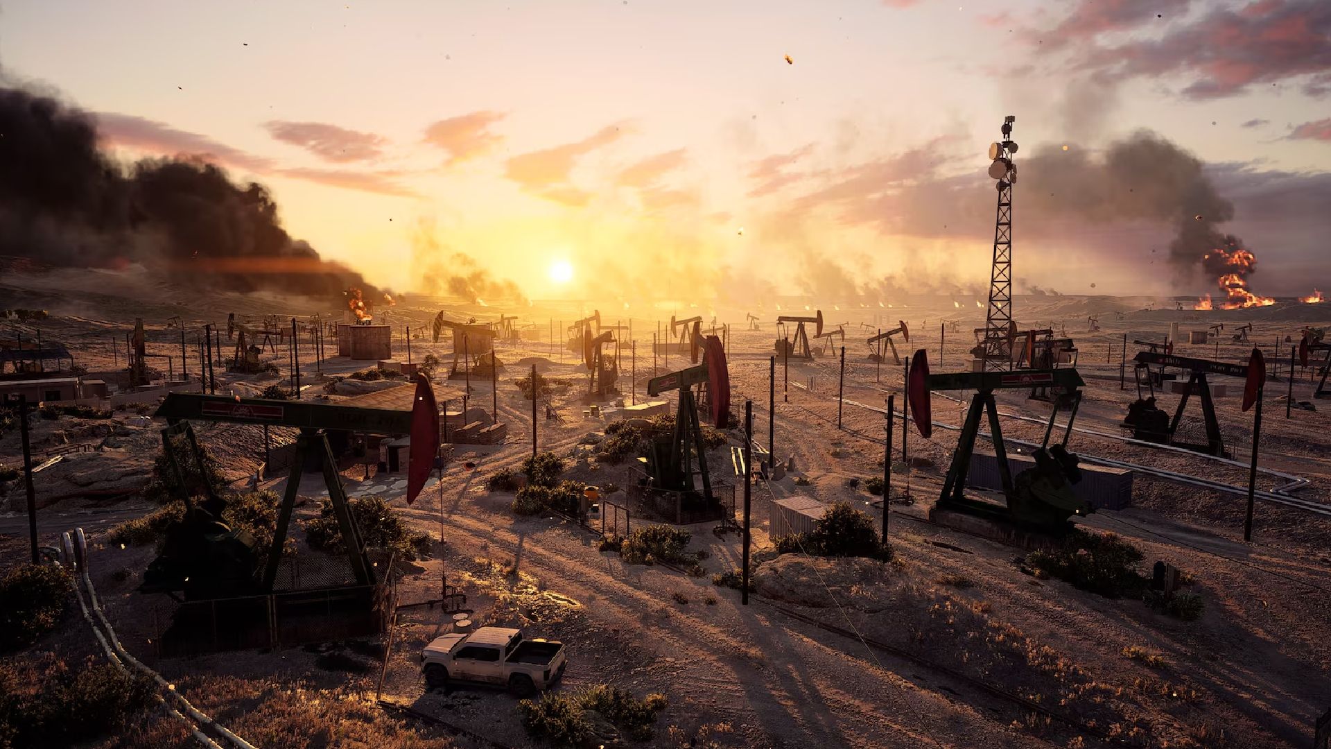 Battlefield 6 oil extraction field at sunet, with black smoke pouring out to the left.