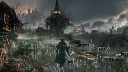 A hunter moves along a narrow and winding road in Bloodborne.