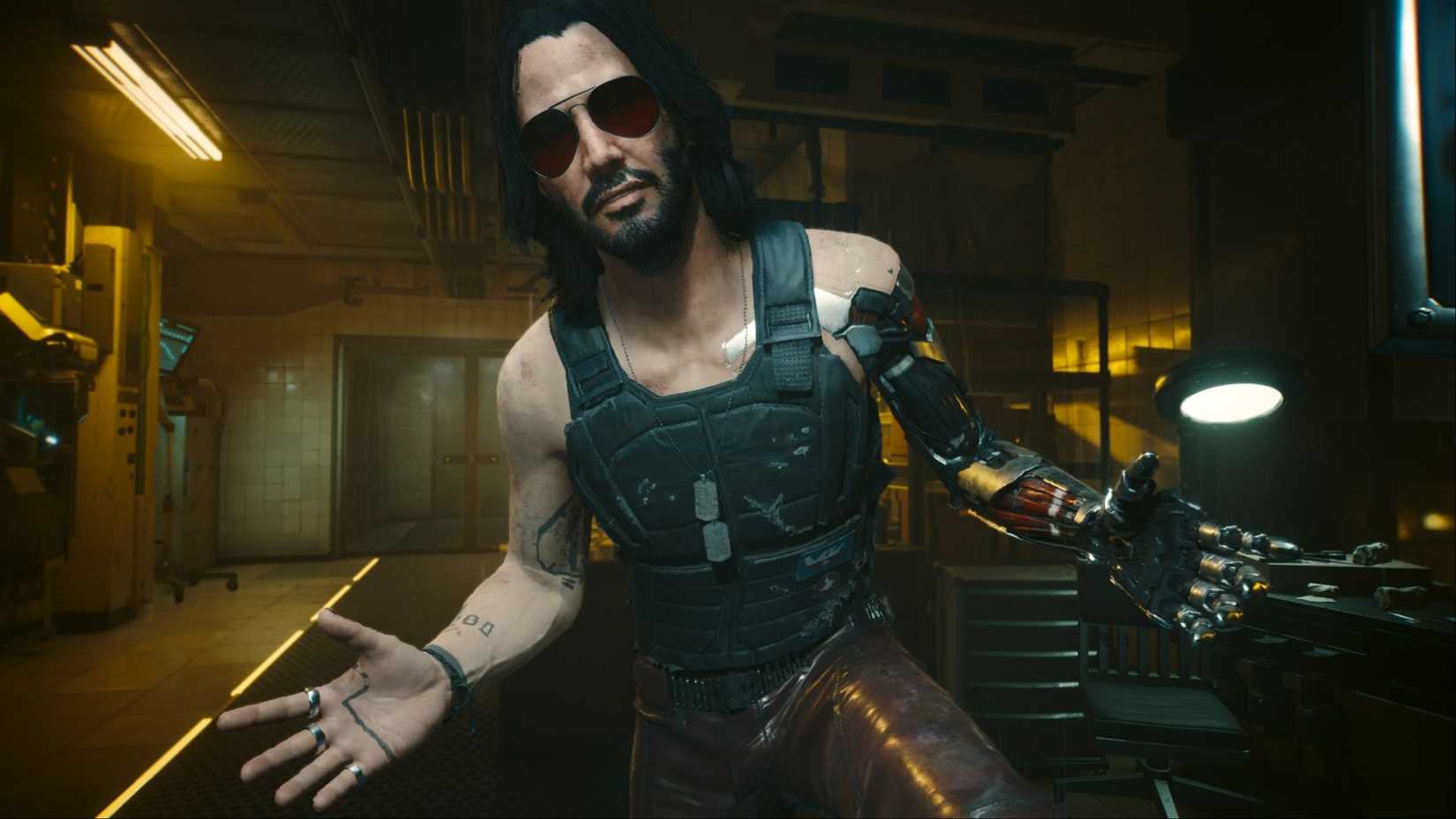 Johnny Silverhand standing with his arms spread outward with a serious look on his face in Cyberpunk 2077.