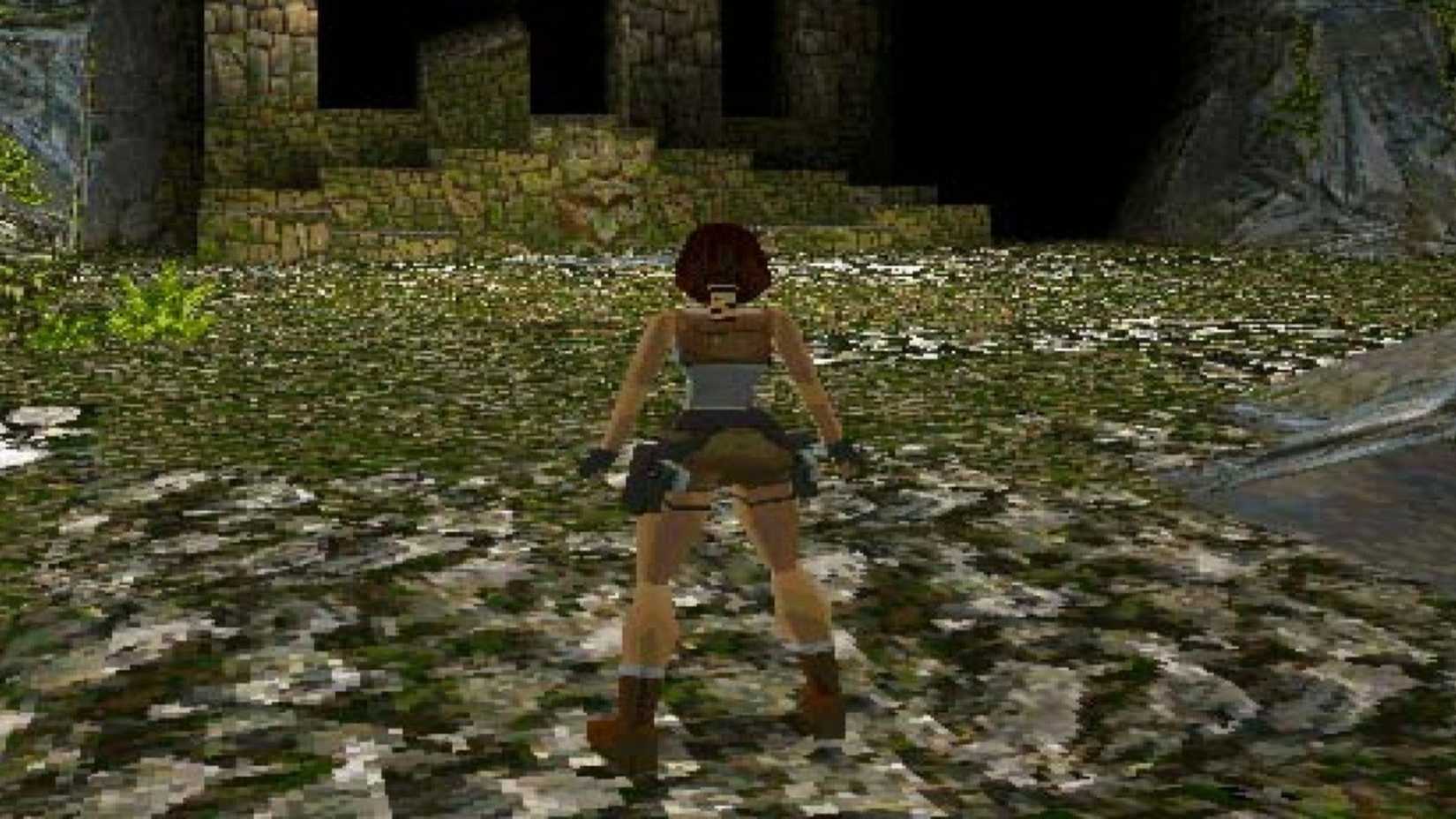 Lara Croft in the original Tomb Raider, looking at the structure.