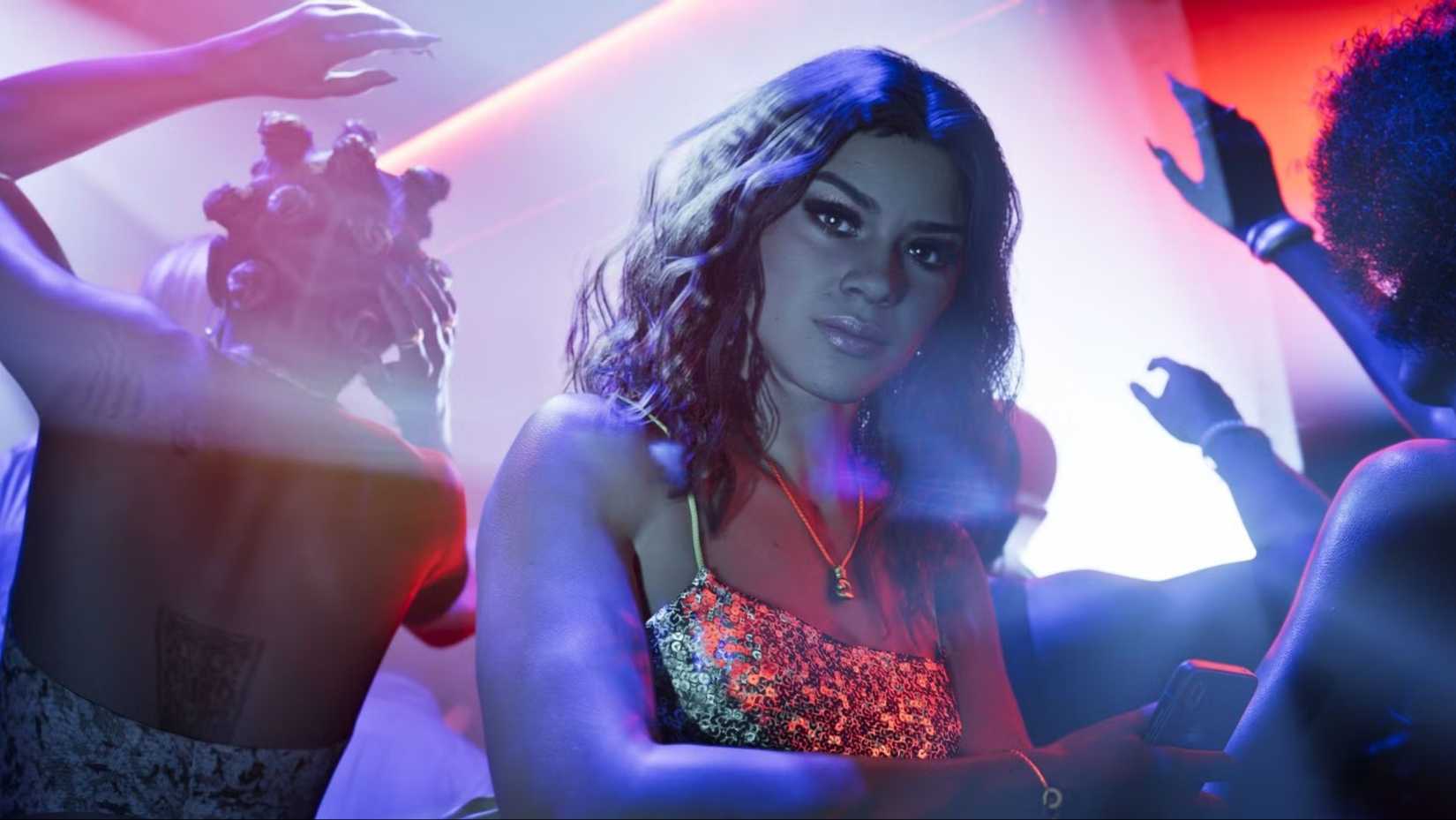 Clubbing Lucia in a golden dress in Grand Theft Auto 6.