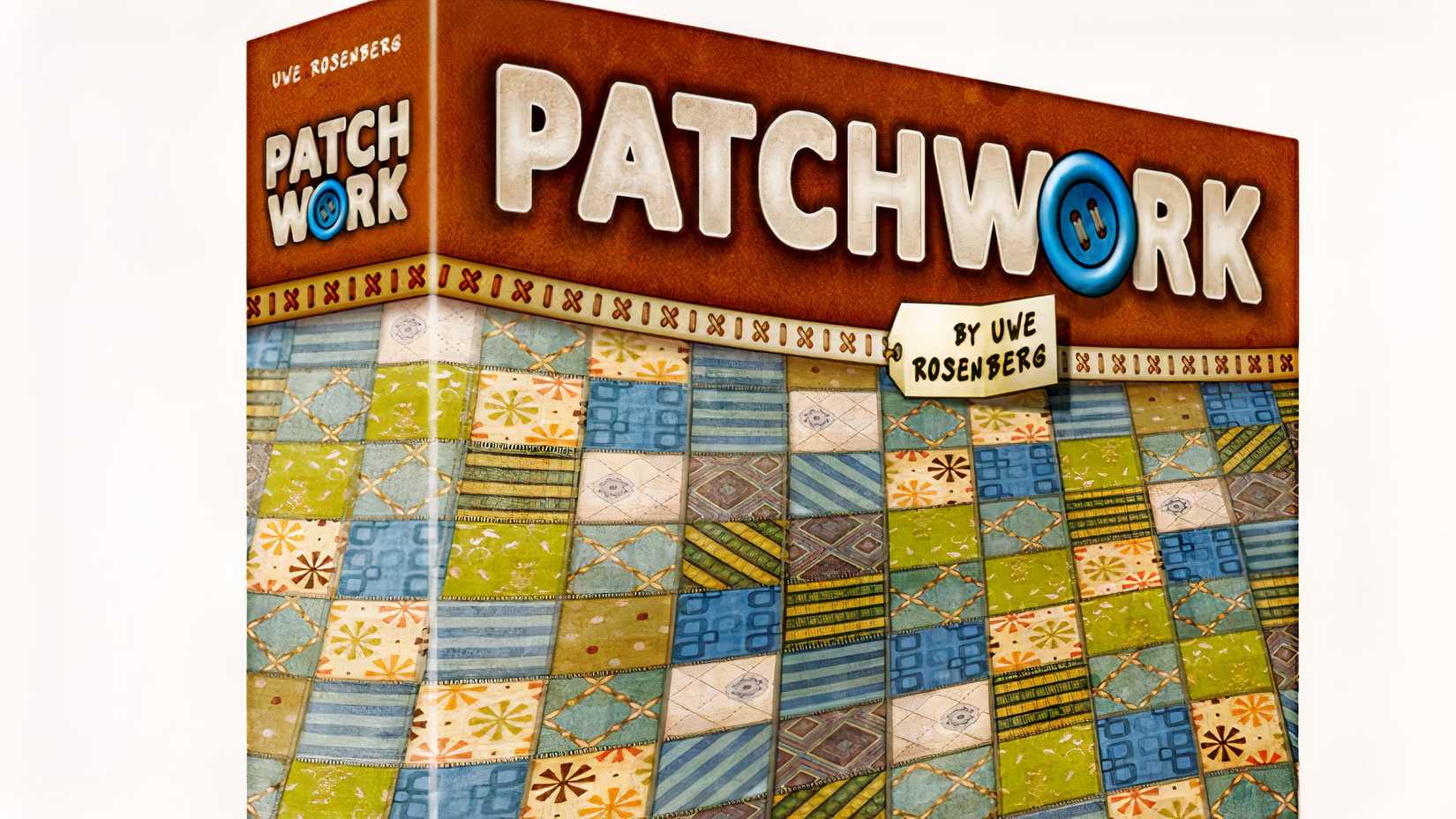 Patchwork board game box standing in front of a white background.
