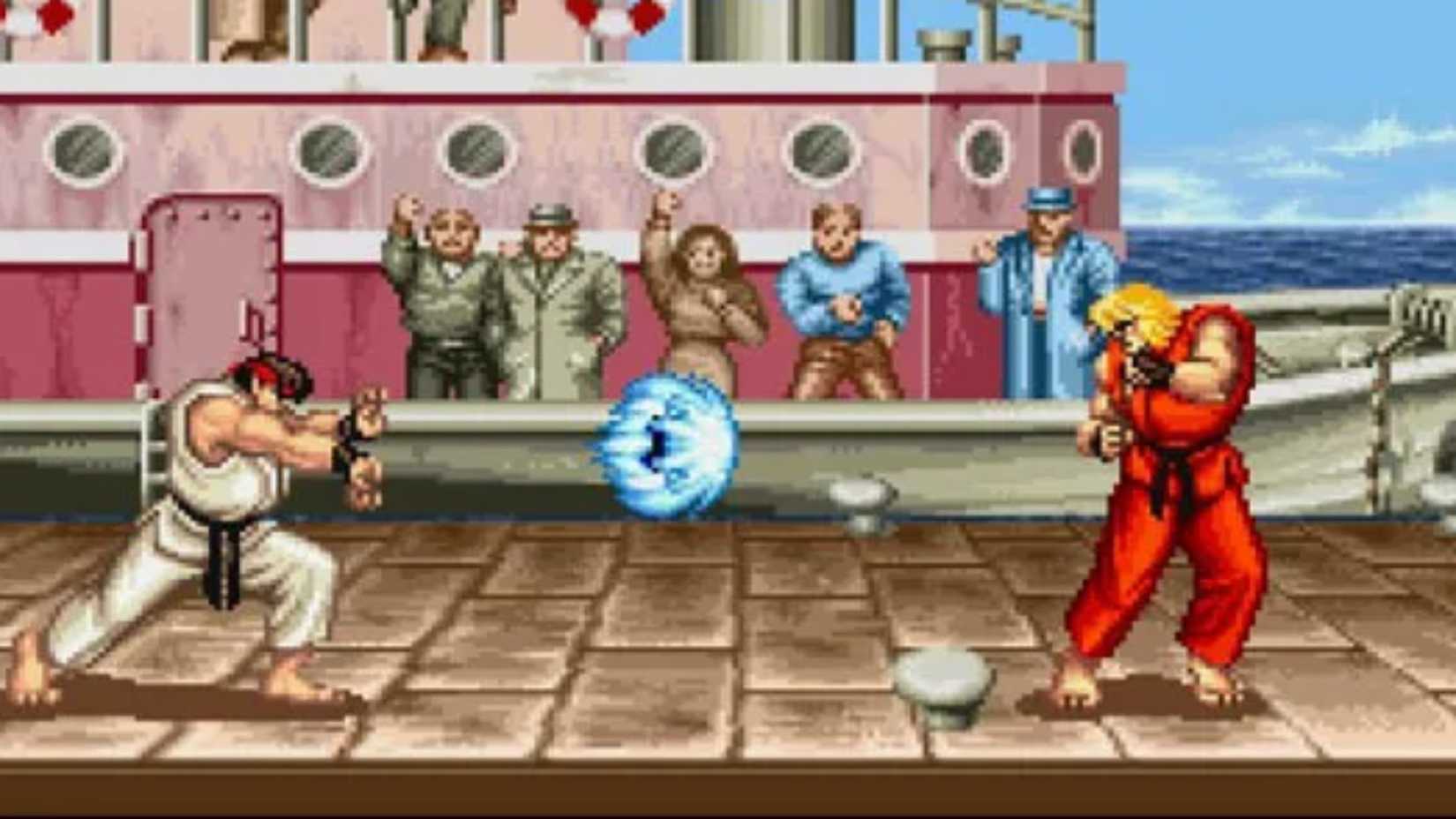 Ryu performs a hadouken on Ken in Street Fighter 2.