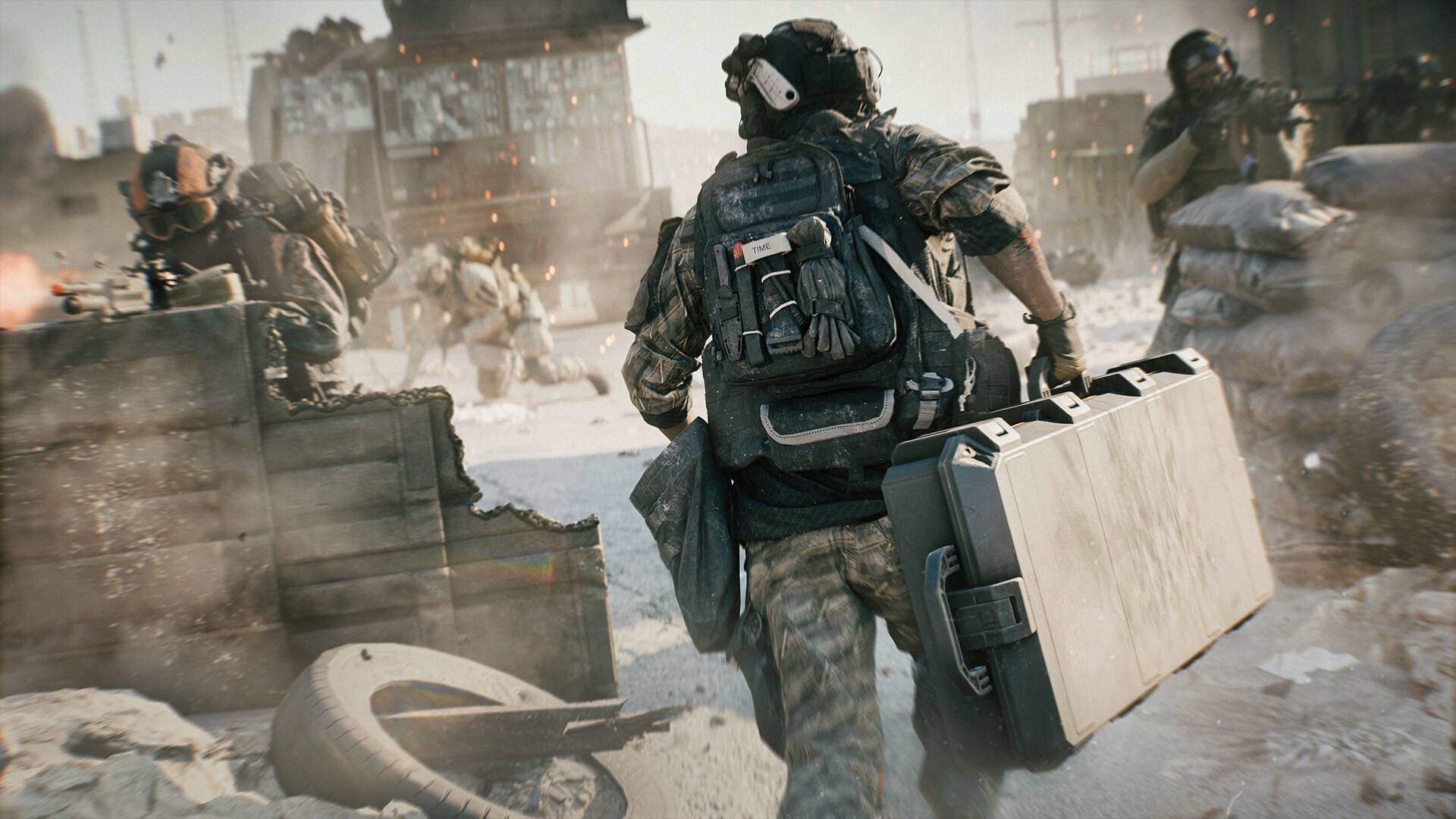 A soldier running with a briefcase while two others cover him in Battlefield 6.