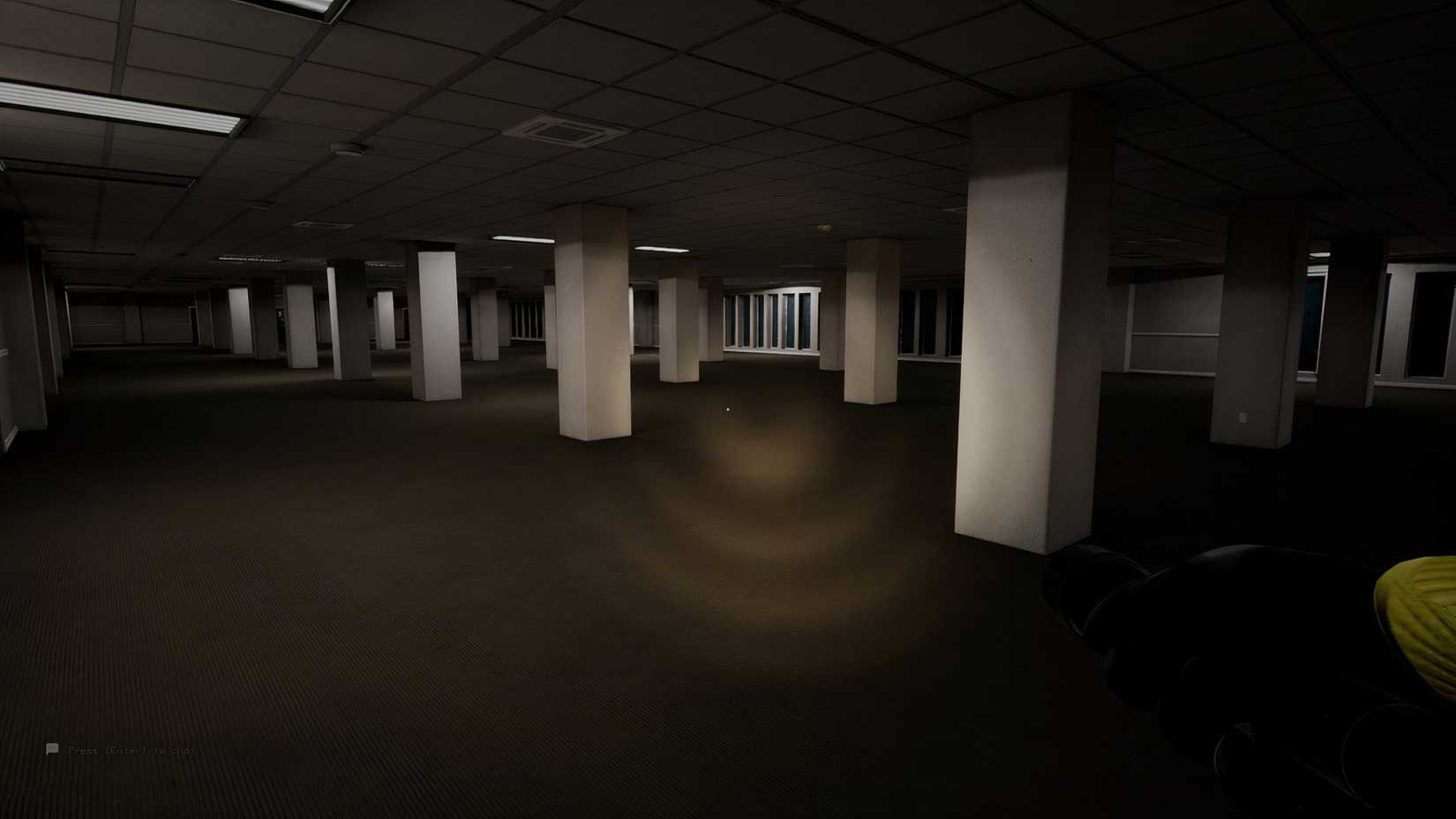 A flashlight shines into an abandoned office area in Escape The Backrooms.