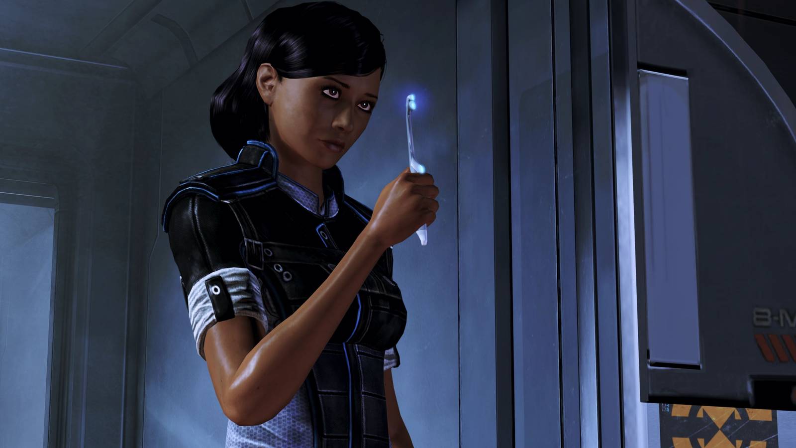 Samantha Traynor holding an electric toothbrush in Mass Effect 3.