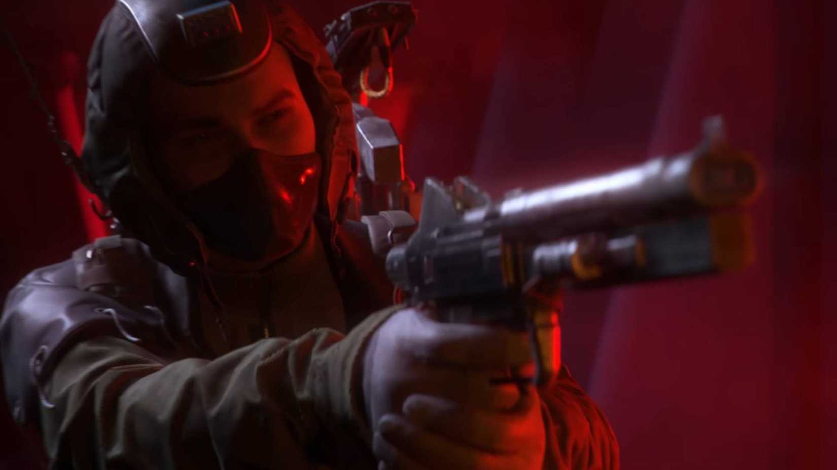 A raider from Arc Raiders pointing a gun in red lighting.