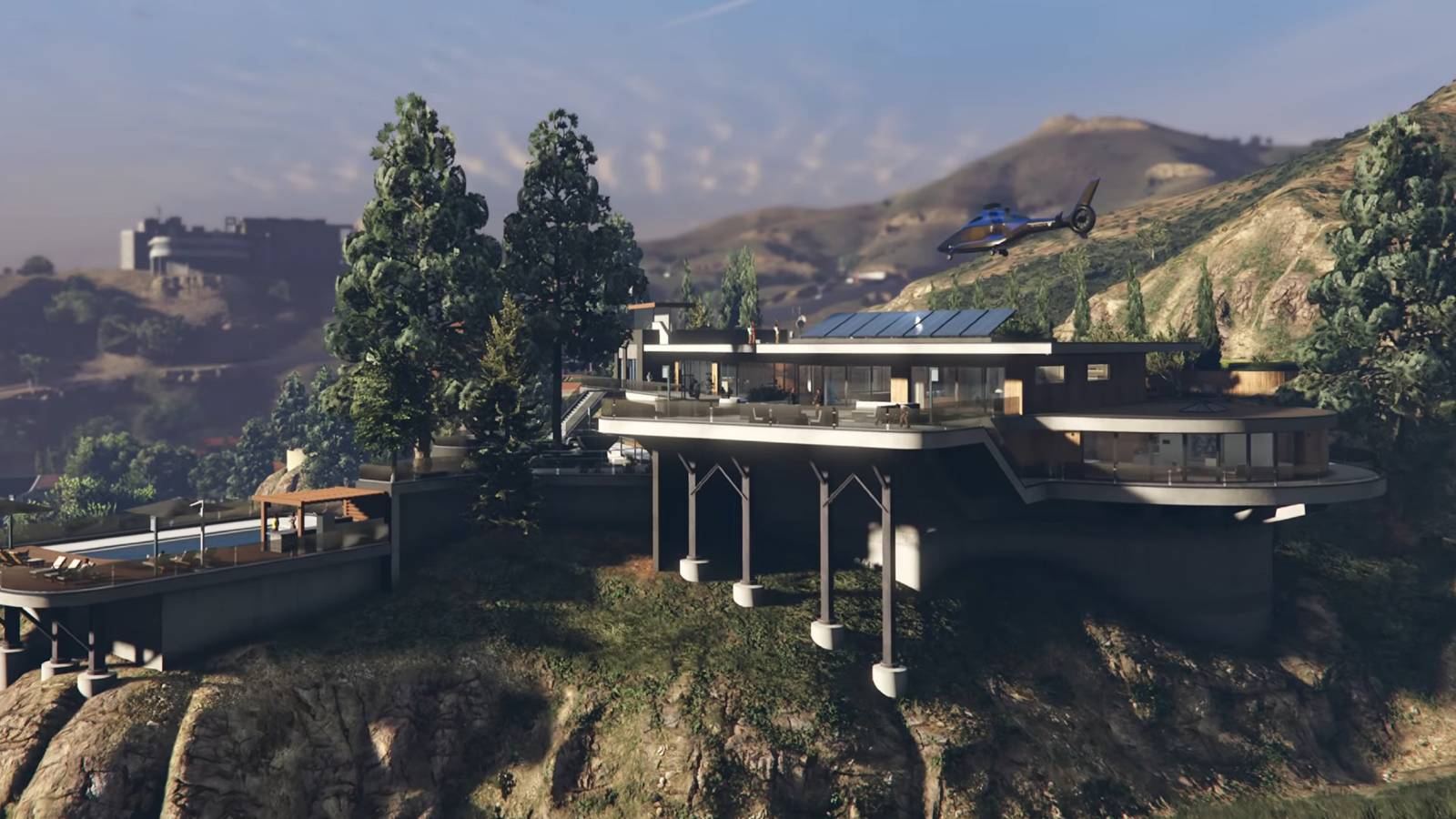 A mansion built on the side of a mountain.