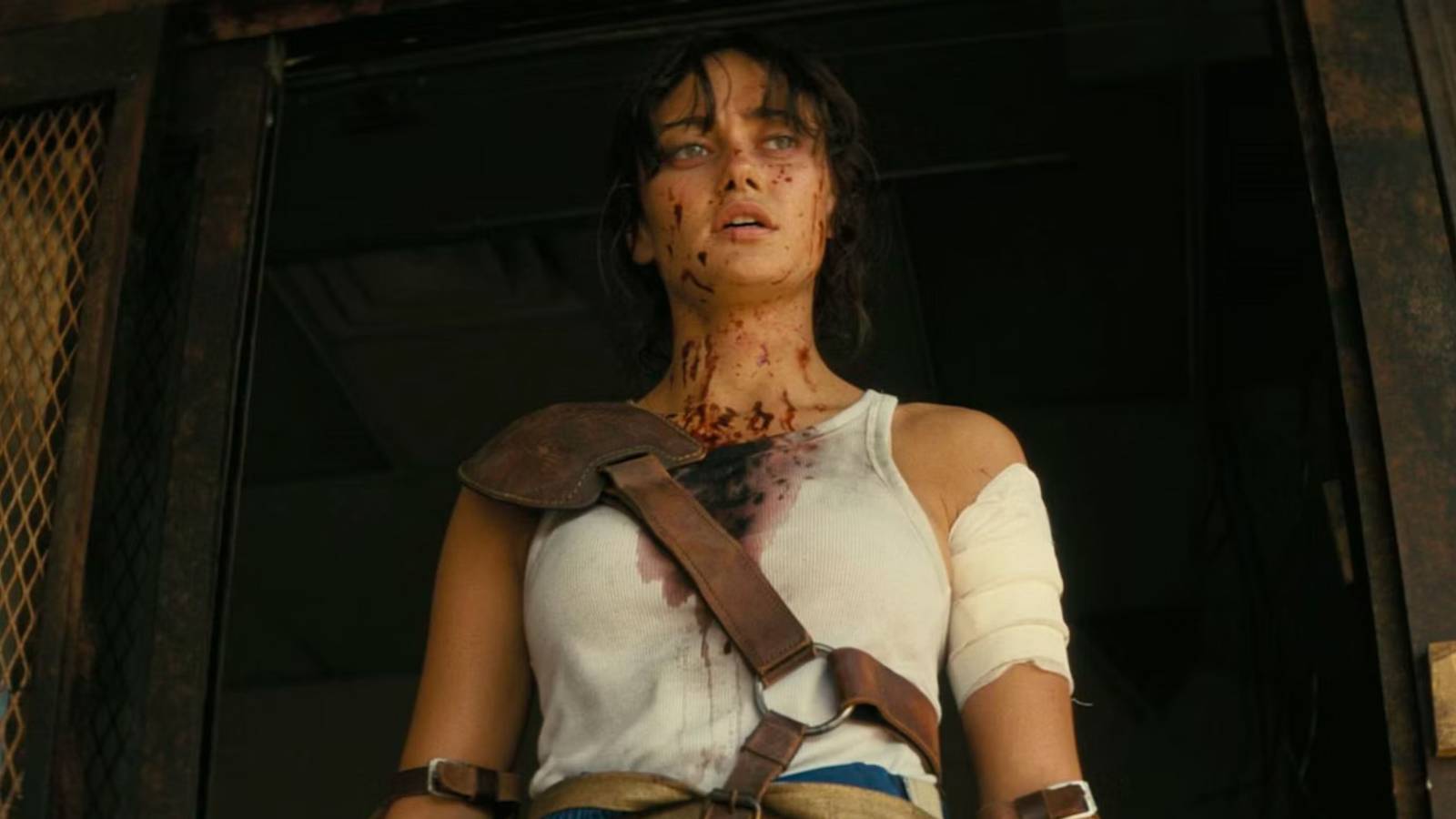 Lucy MacLean wearing a bloodied tank top in Fallout.