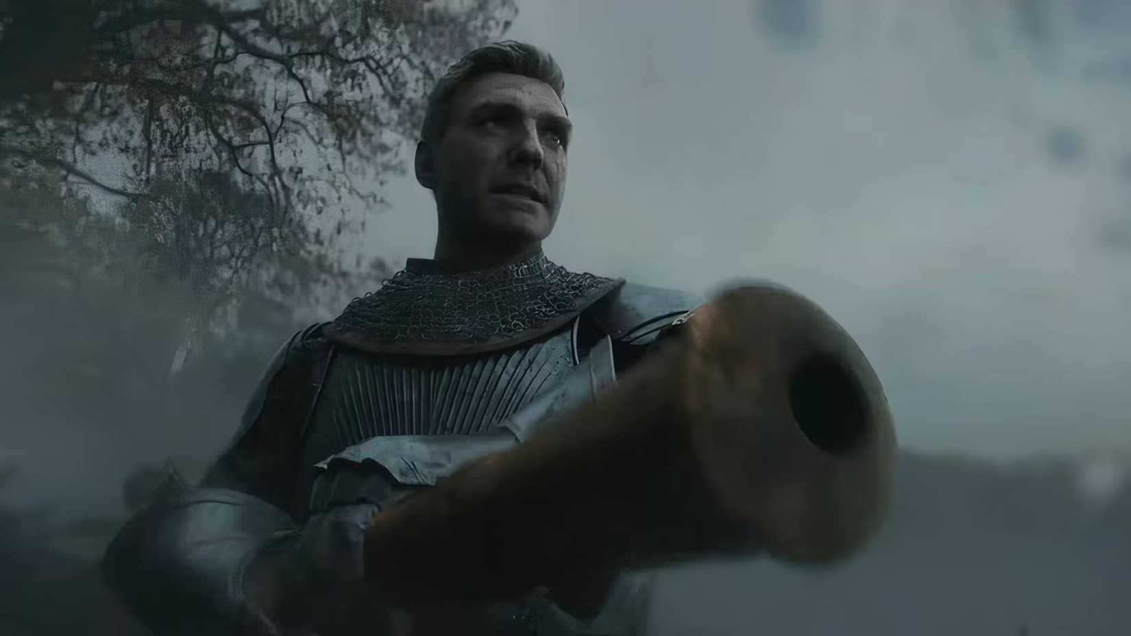 Henry holding a gun from the Kingdom come deliverance 2 cinematic trailer.