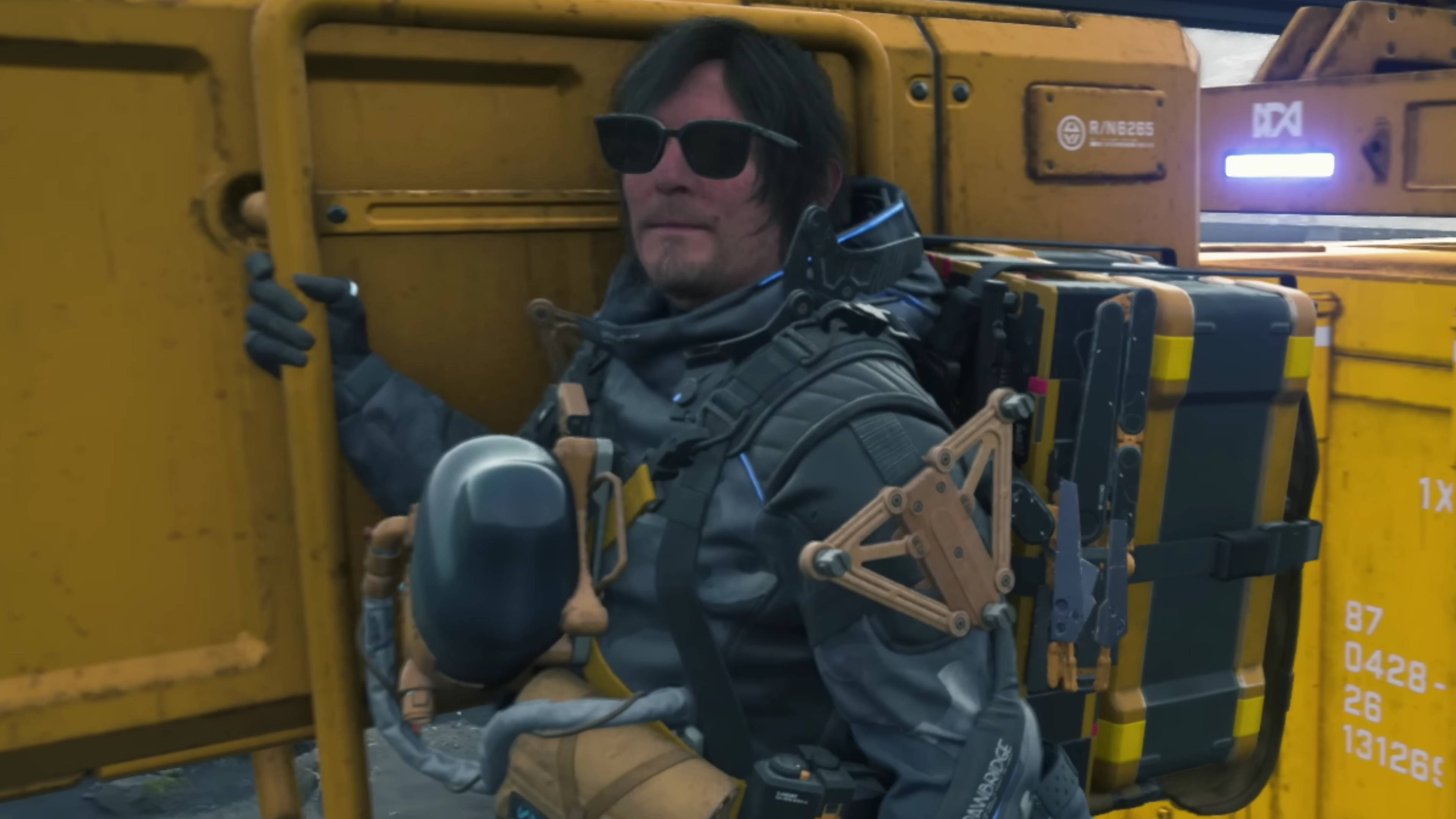sam wearing sunglasses in death stranding 2.