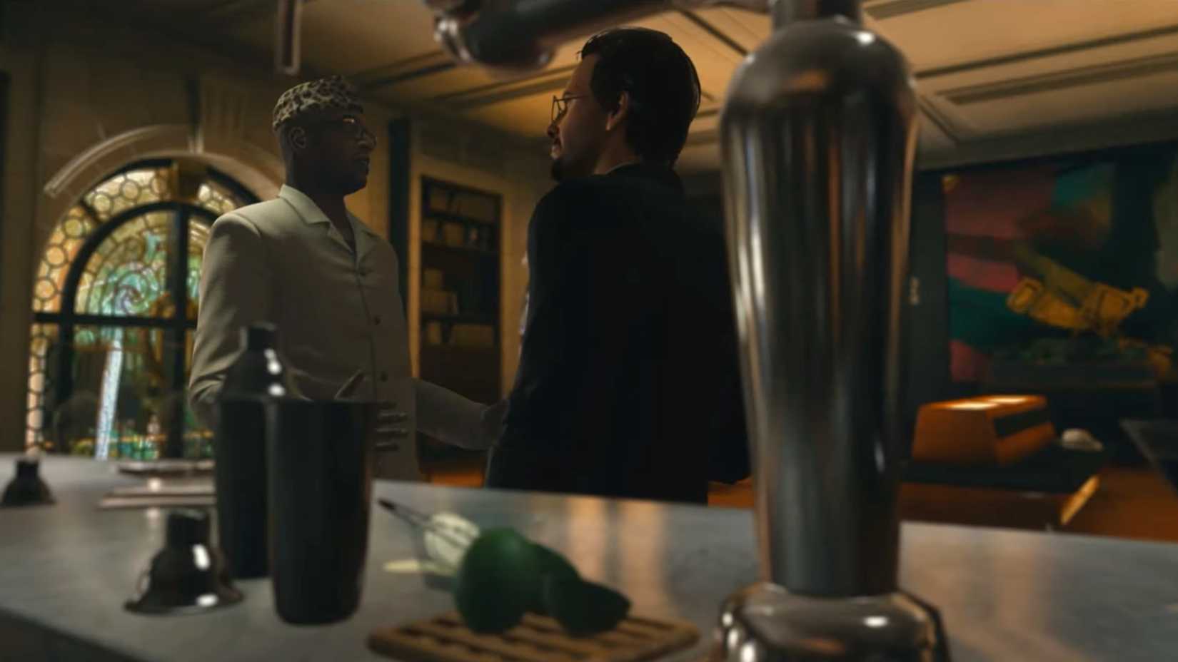 Richard Ekwensi talking to a guy in a pre-mission intro video in Hitman: World of Assassination.