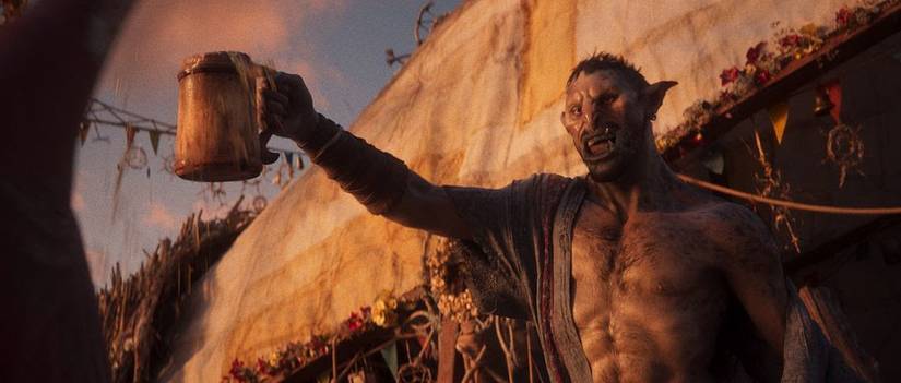 An orc raises a toast in the Divinity reveal trailer.