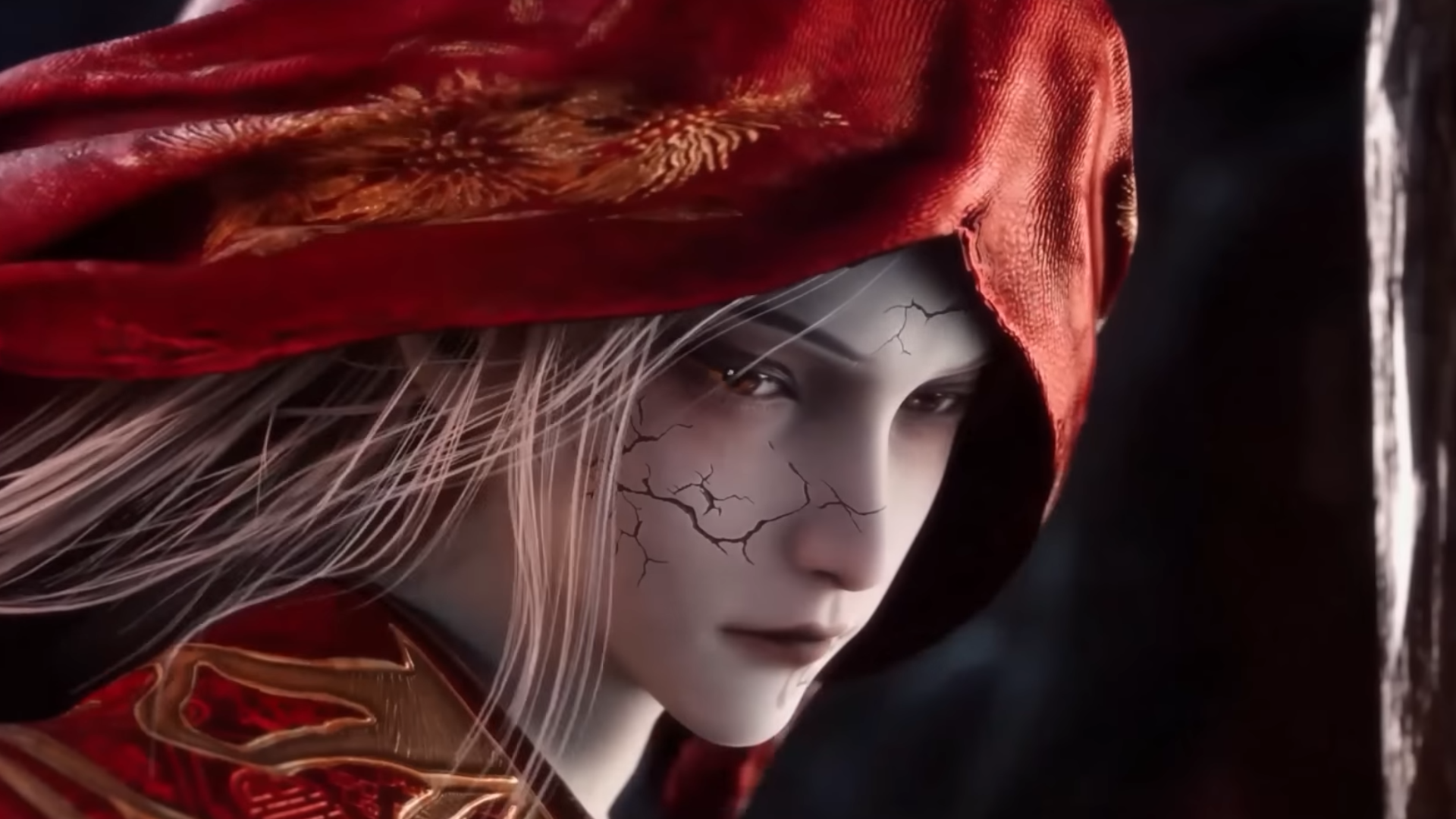 a woman wearing a red shawl with marks on her face in where winds meet.