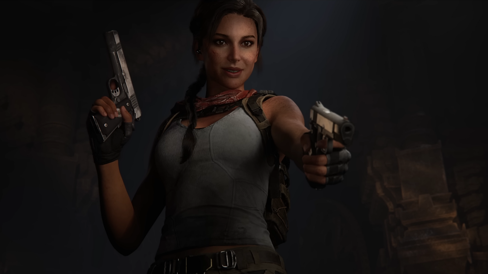 lara croft smiling with a pair of pistols.