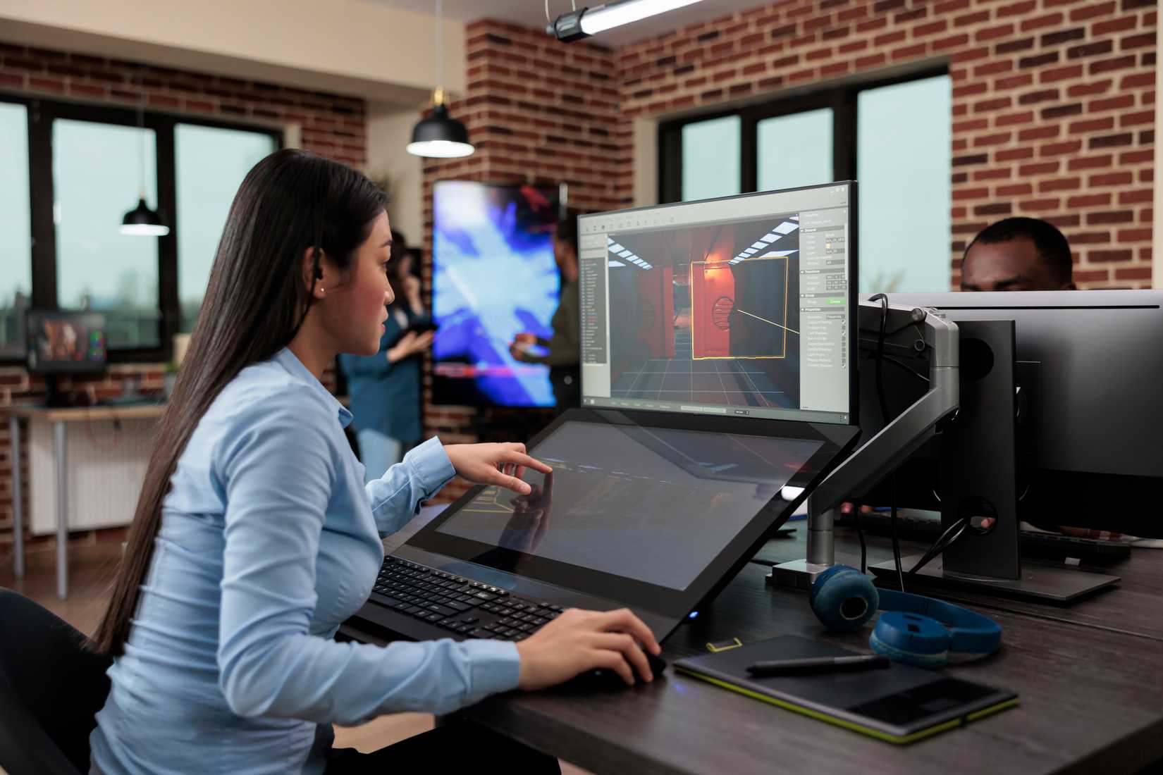 Game developer working on level design.