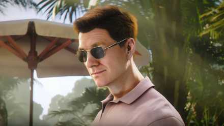James Bond in pink shirt and sunglasses in 007 First Light.