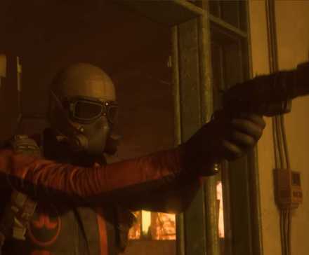 A masked raider entering the room with their gun drawn in Arc Raiders.
