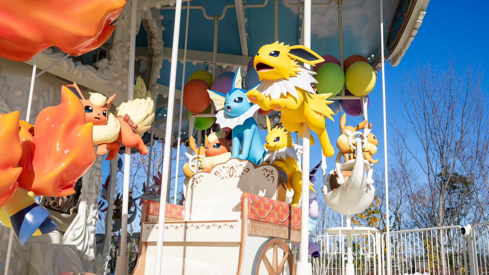 flareon, vaporeon, and jolteon in the vee vee voyage ride at pokepark kanto.