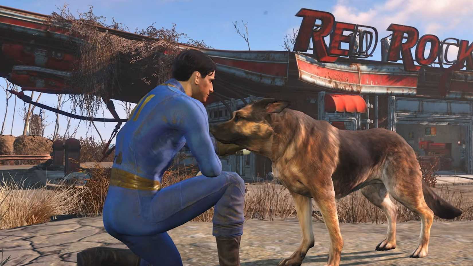 Fallout 4 screenshot showing a male vault dweller petting a dog in front of a ruined gas station.