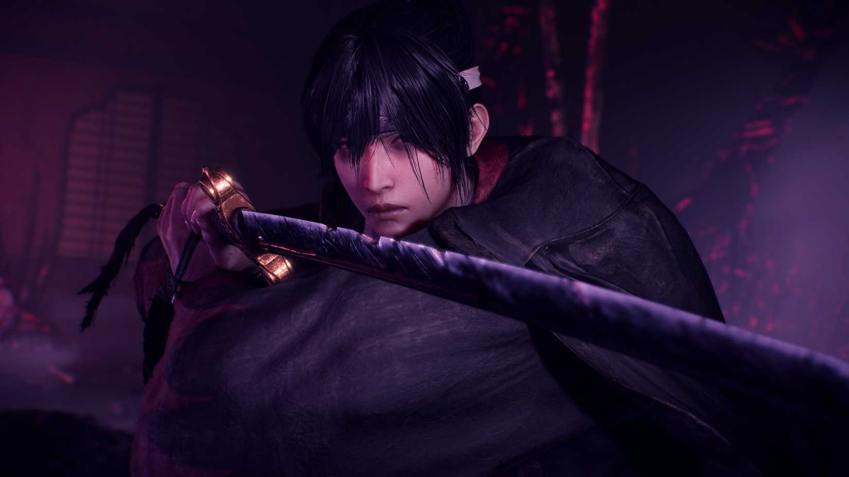 nioh character pointing a sword at the camera.