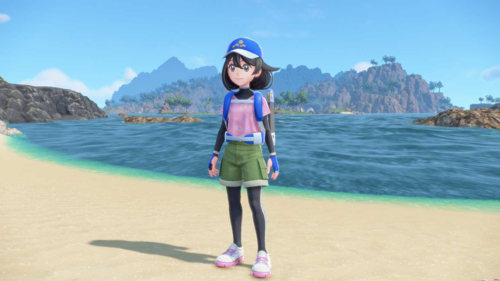 A character standing on a beach in Pokemon Winds and Waves.