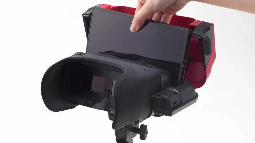 Inserting the Nintendo Switch into the Virtual Boy Peripheral.