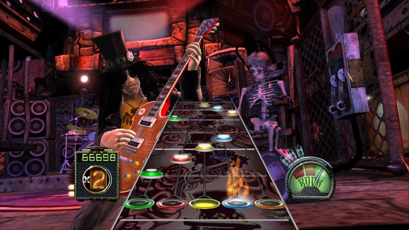 Slashing your guitar as colorful notes fill the screen in Guitar Hero 3: Legends of Rock.