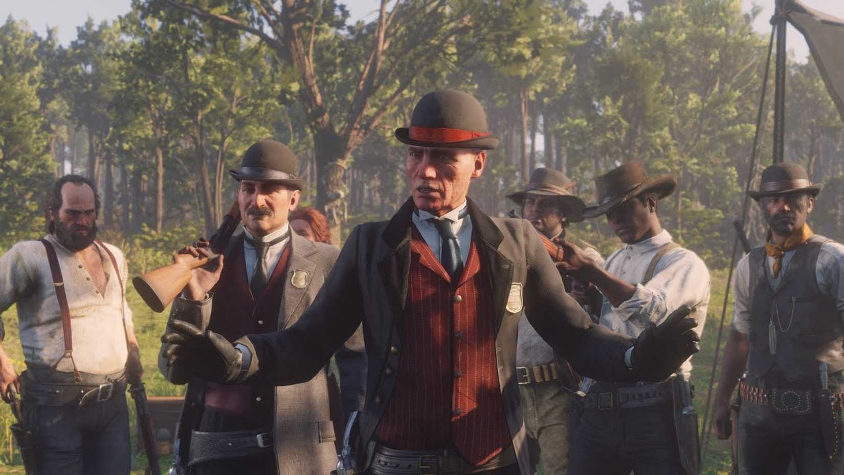 Milton and Edgar Ross speaking with the Van Der Linde Gang in Red Dead Redemption 2.