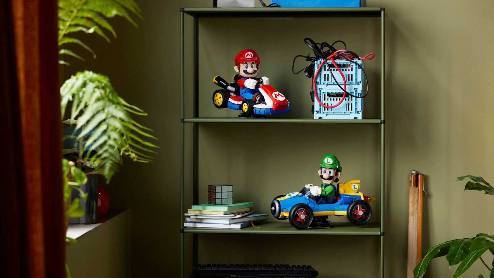 mario nad luigi kart sets on shelves.
