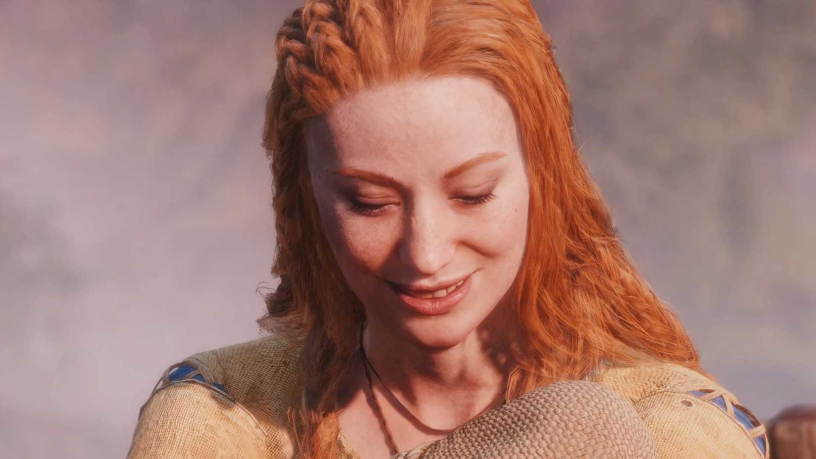 Faye from God of War, smiling and looking down at baby Atreus.