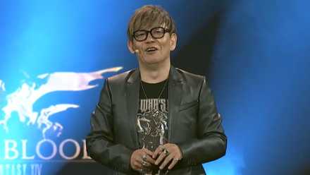 Yoshi-P on stage at FanFest