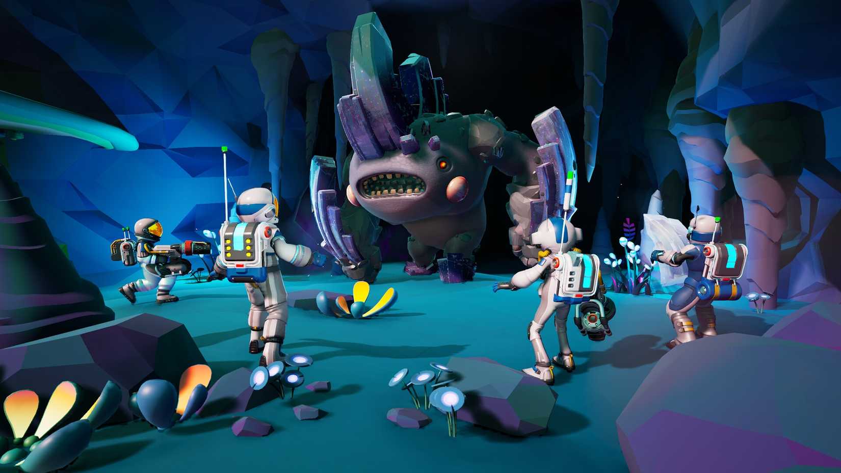 A group of astronauts surrounding a monster in Starseeker Astroneer Expeditions.