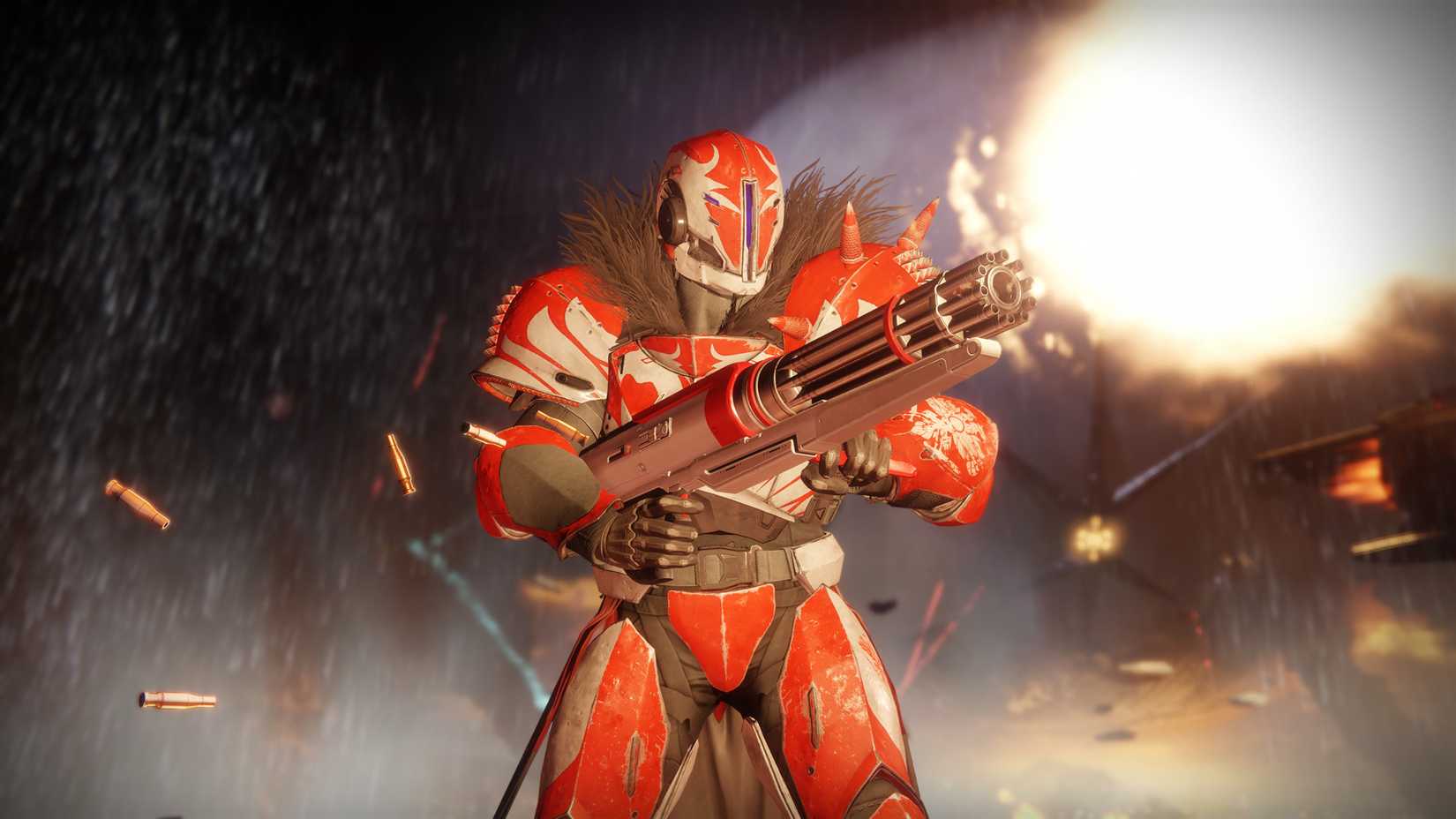 Destiny 2 character in red armor with a gun.