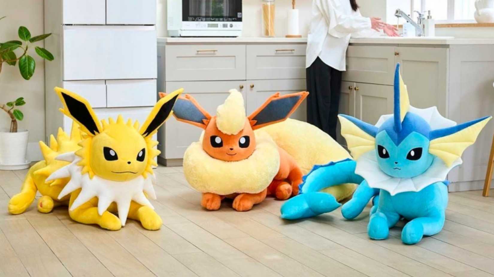 Flareon Jolteon and Vaporeon life-size plush toys.