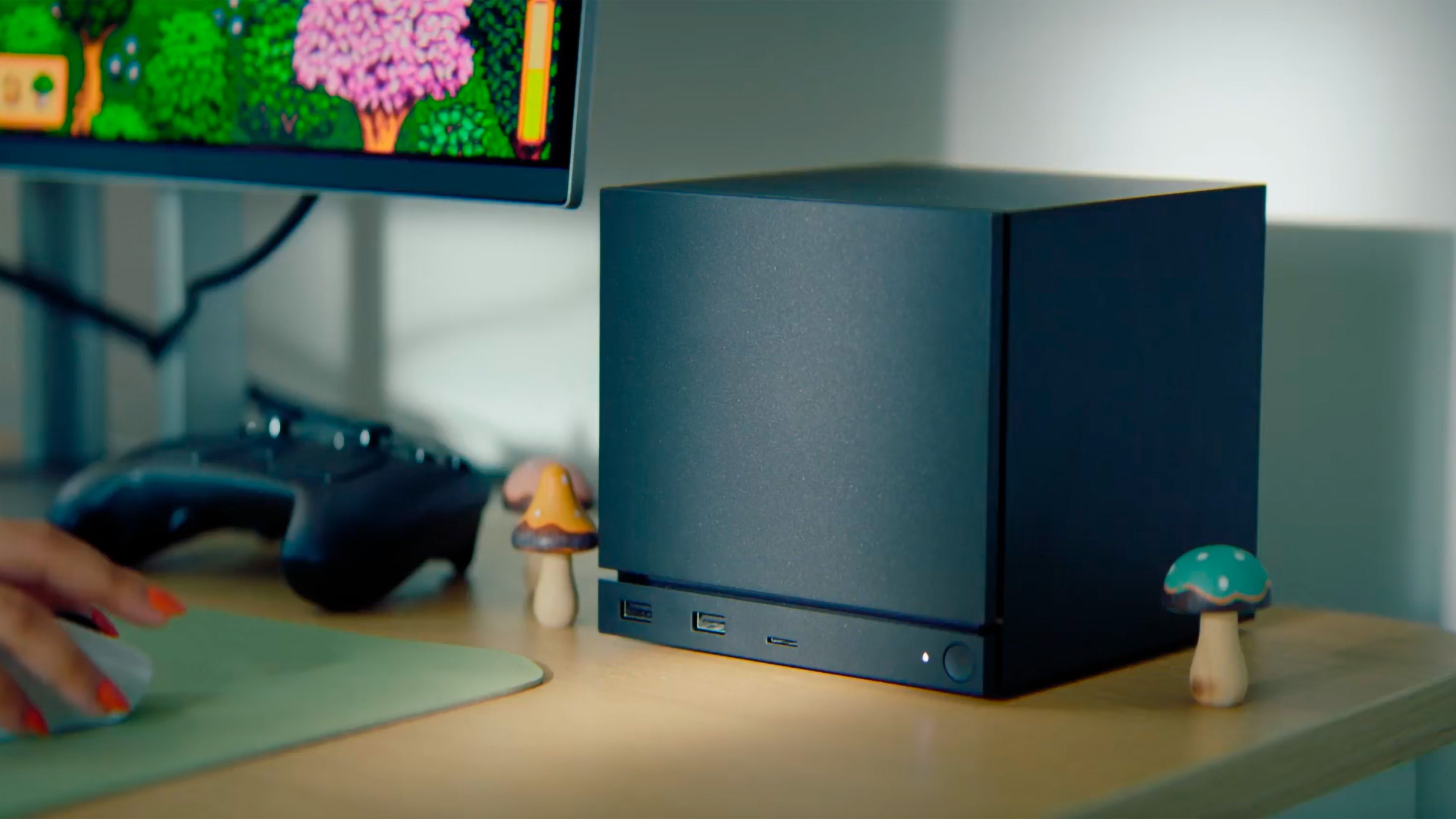 Steam machine on desk.