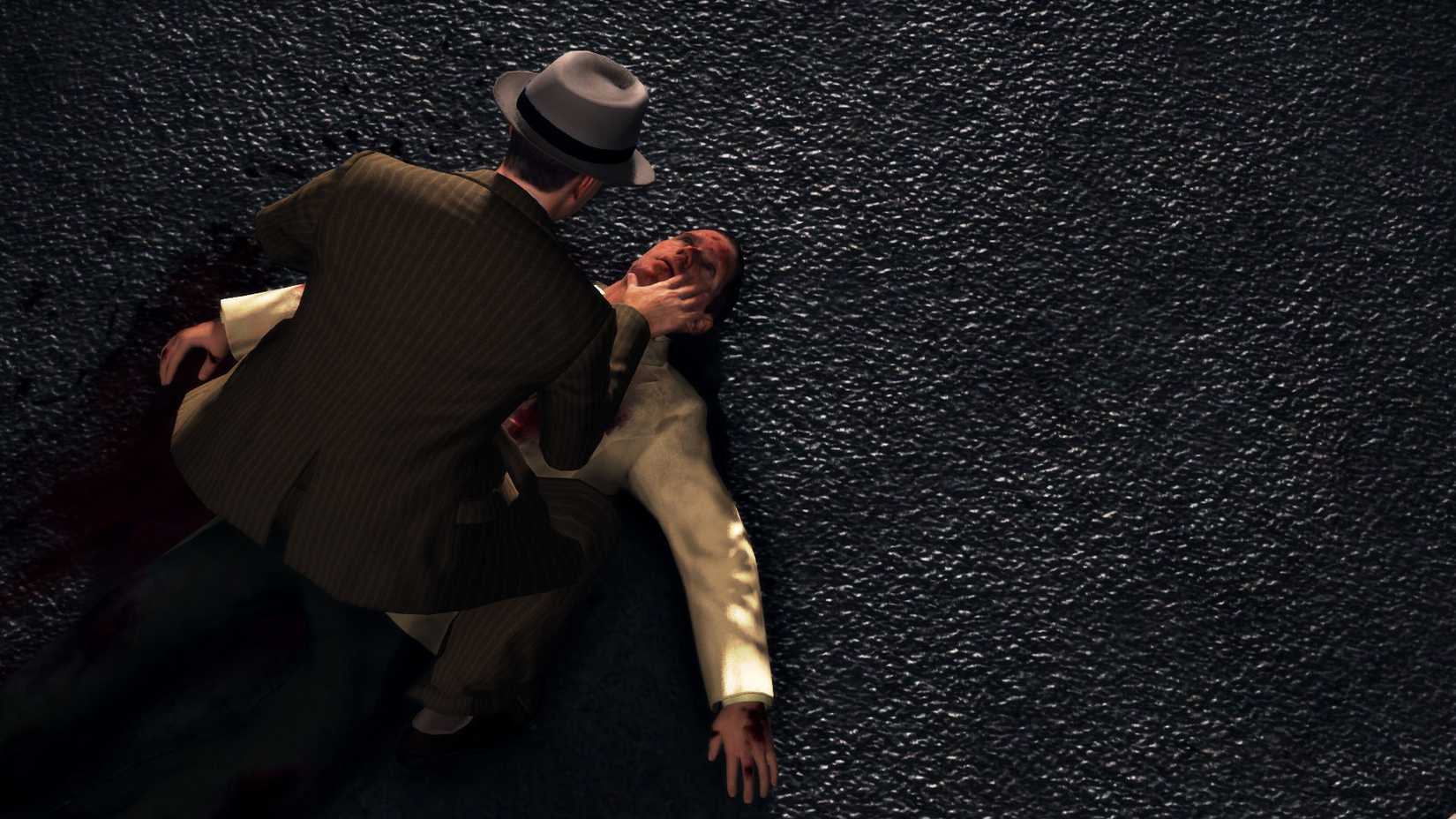 Cole Phelps investigates a dead body in LA Noire.